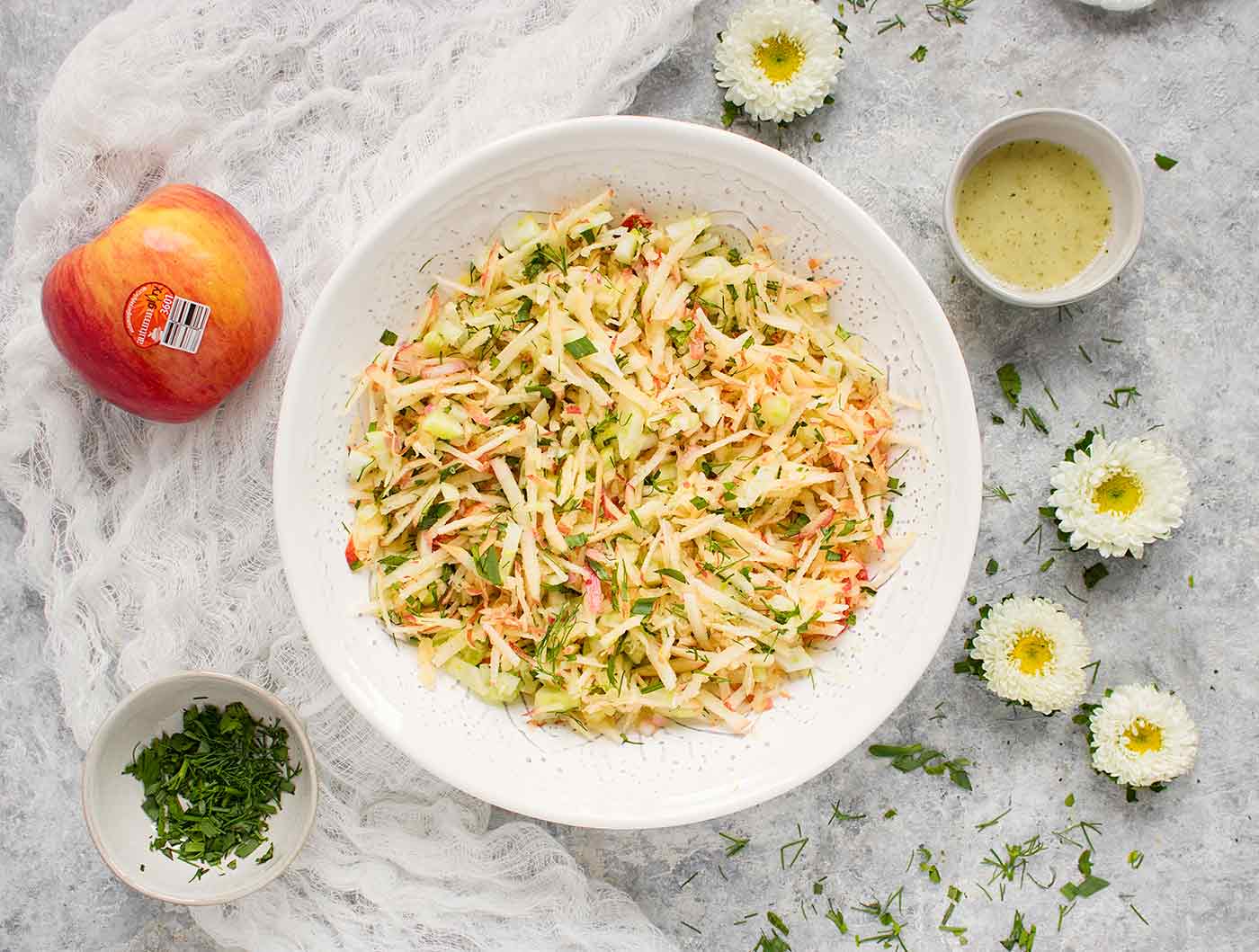 Apple Fennel Slaw made with Autumn Glory Apples, served in a white bowl