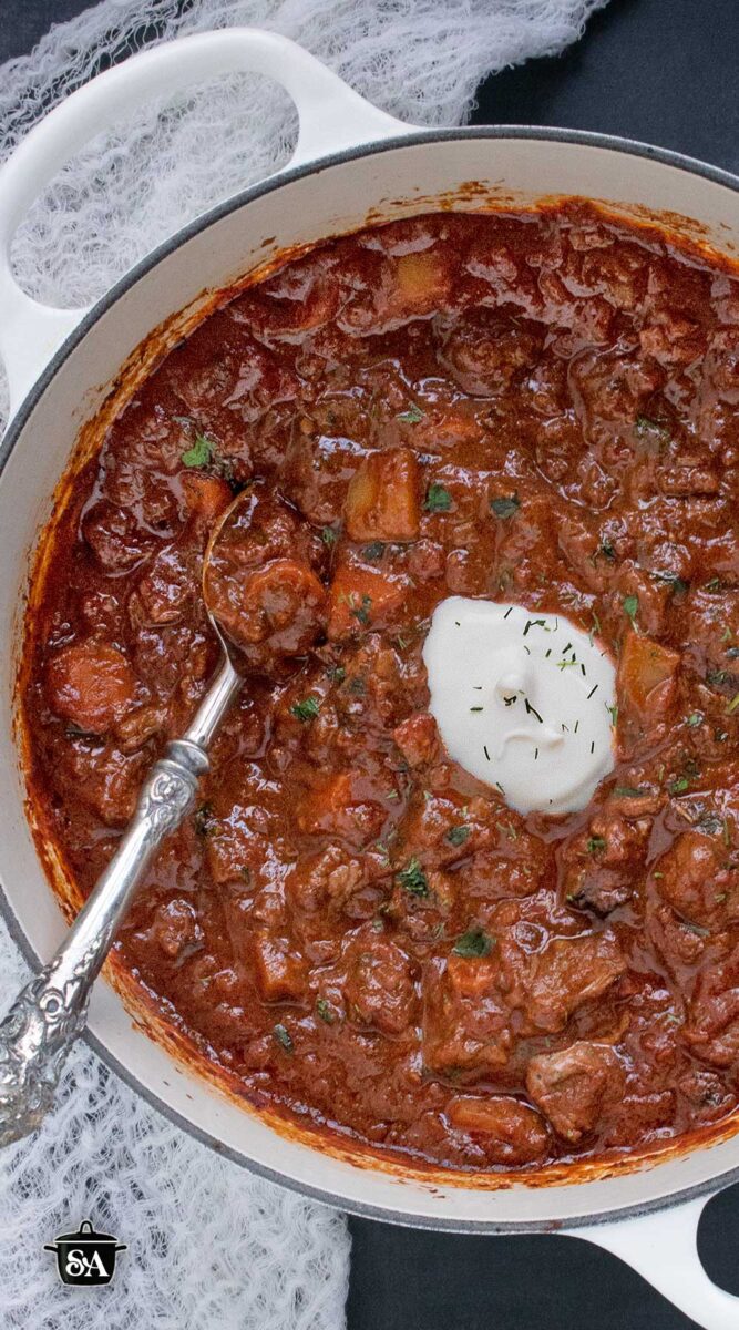 Pinterest pin image for Austrian Hungarian Goulash.