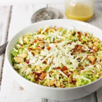 Everyone will love this winter salad! Raw Brussels sprouts are fabulous: milder than most cabbages, crunchy, and ever-so-slightly sweet. Add apples, fennel, bacon, Pecorino, and a tasty apple cider vinaigrette, and you've got one amazing Brussels Sprouts Salad! Get the recipe at SoupAddict.com