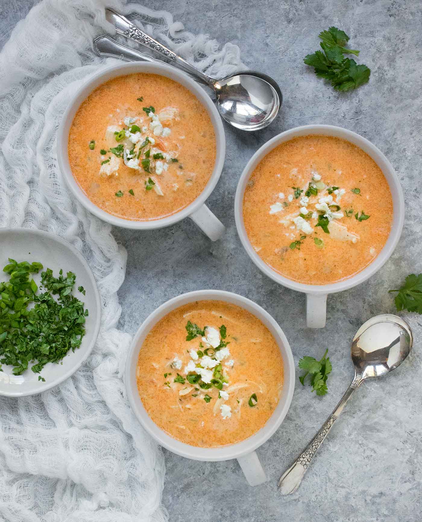 Three soup mugs with Buffalo Blue Cheese Chicken Soup