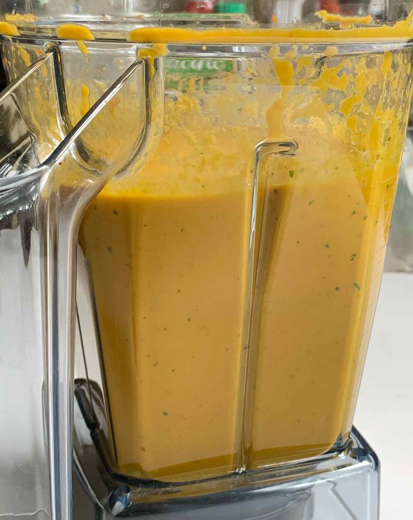 Carrot Gazpacho in the jar of a blender.