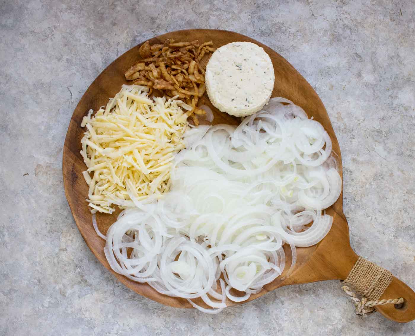 Ingredients for this fried toast spread out on a wooden serving board.