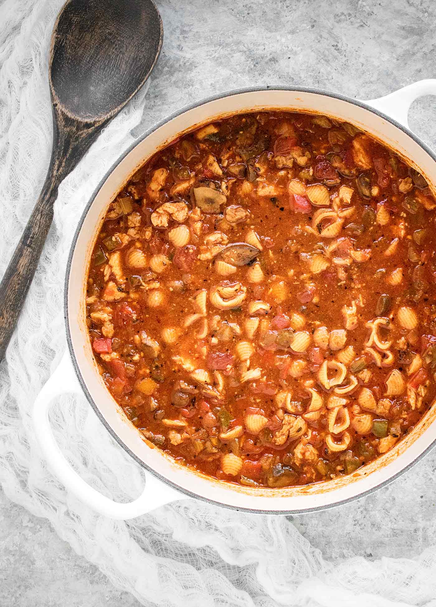 Chicken Chili Soup in a white Dutch oven, ready to serve