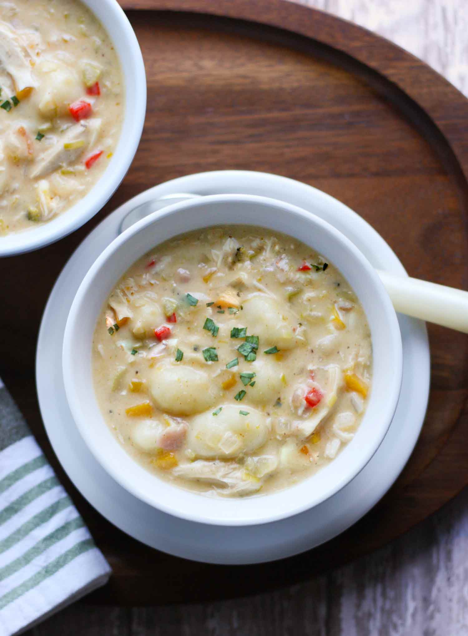 Overhead view of a bowl of Chicken Gnocchi Soup.