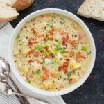 Overhead view of bowl of Chicken Potato Soup with Bacon.