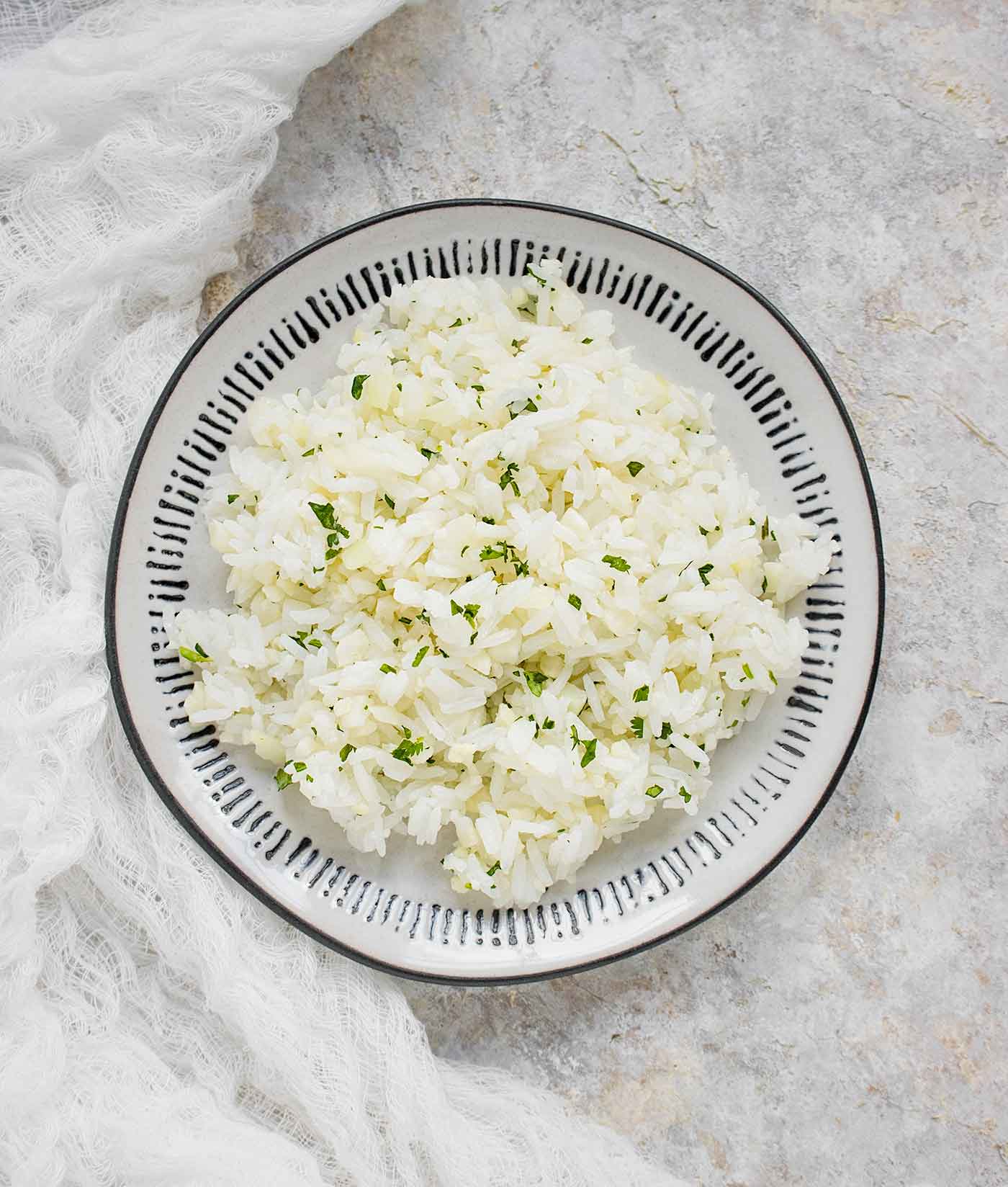 A serving of cauliflower jasmine rice blend on a plate