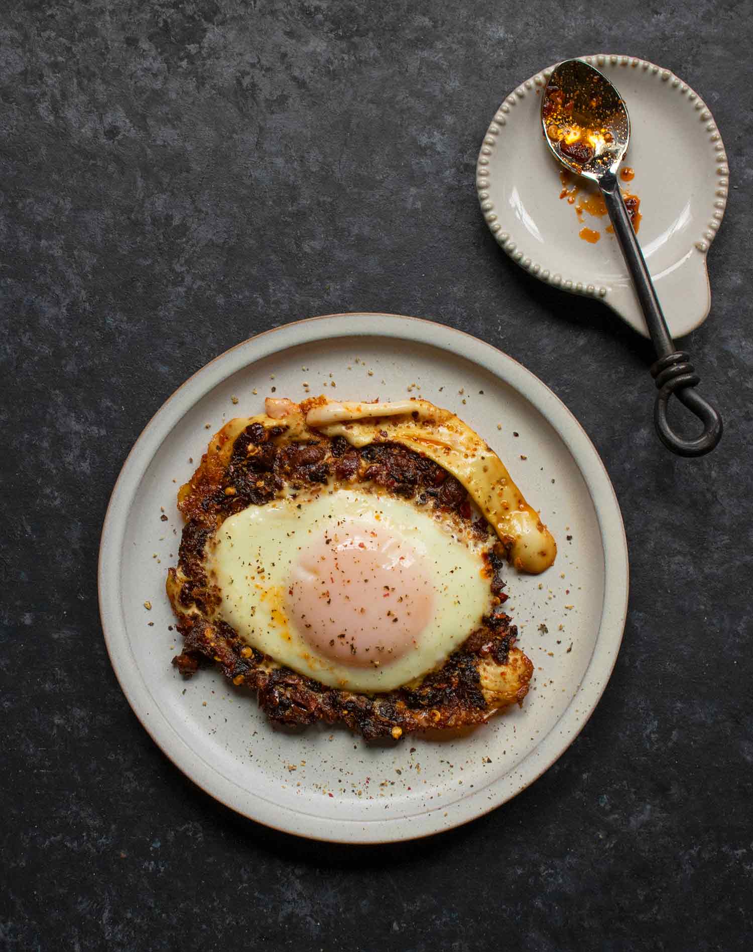 Chili Fried Egg on a gray plate.