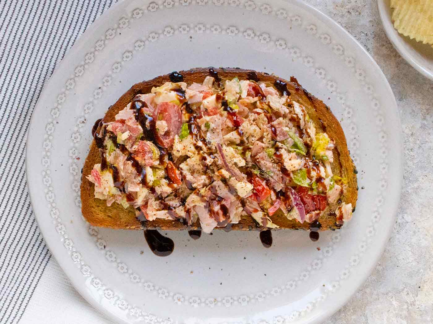 Overhead view of Chopped Grinder Fried Toast on a gray plate.