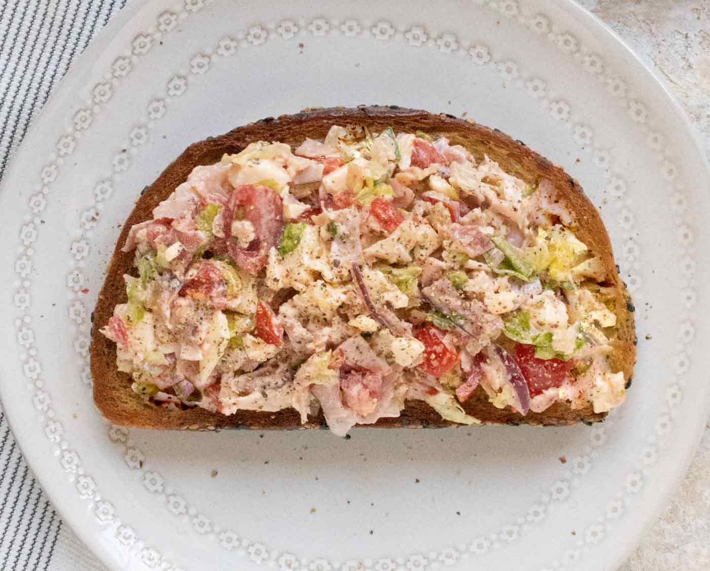 The fully assembled Chopped Grinder Fried Toast, ready to serve.