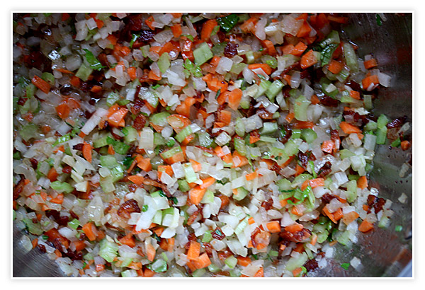 Vegetables and bacon sizzling