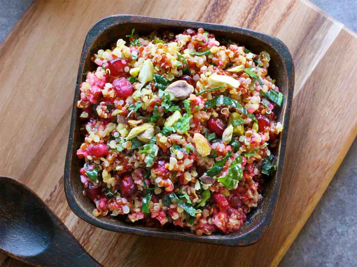 Overhead view of a bowl of Cranberry Quinoa Kale Salad.