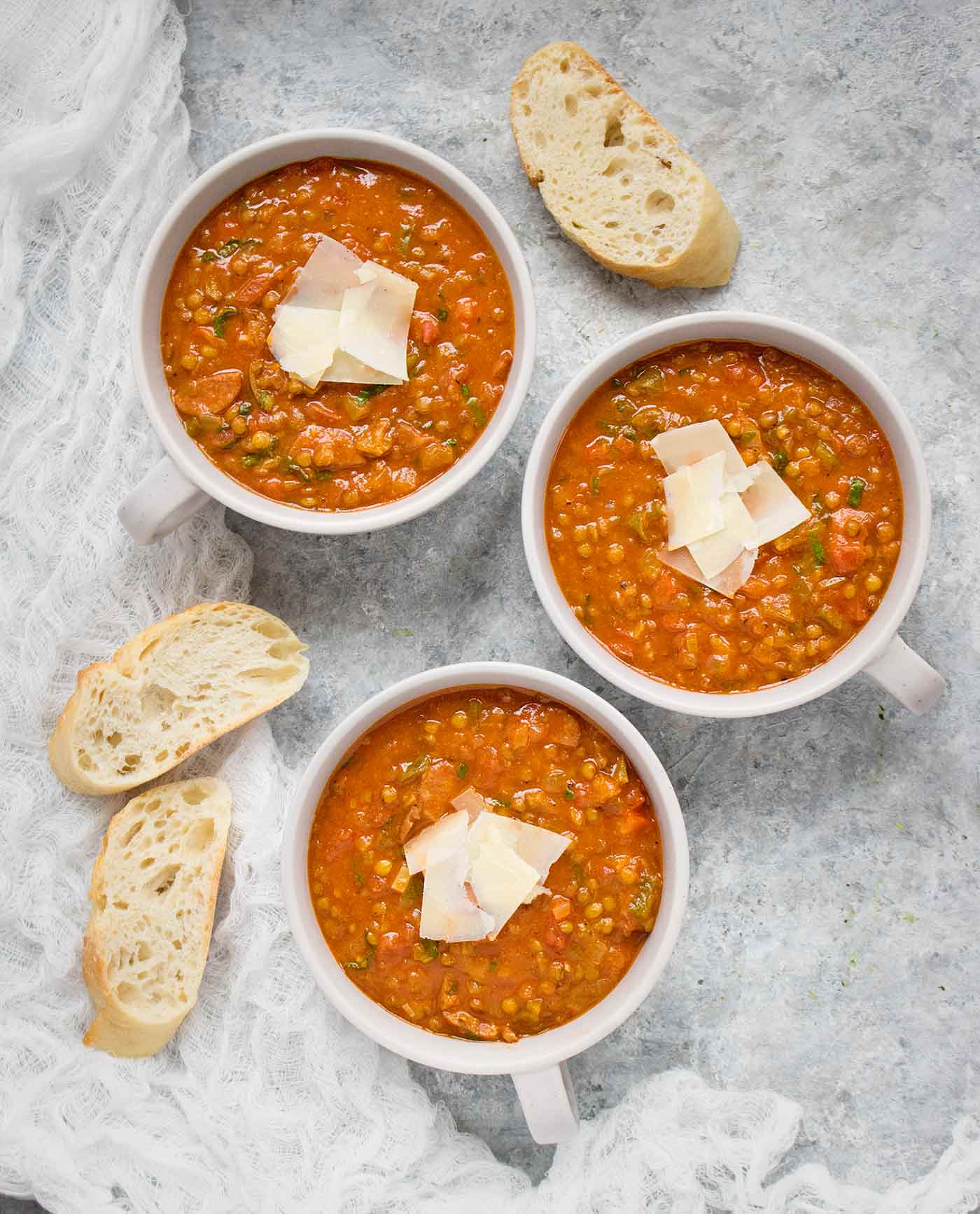 Three bowls of Creole Lentil Soup with Andouille Sausage