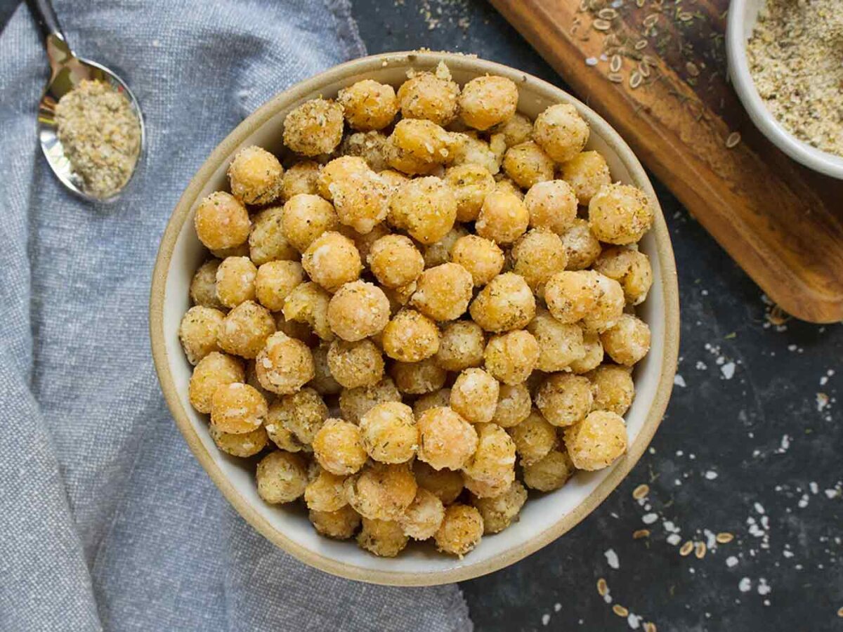 Overhead view of a bowl of crispy Dill Pickle Chickpeas.