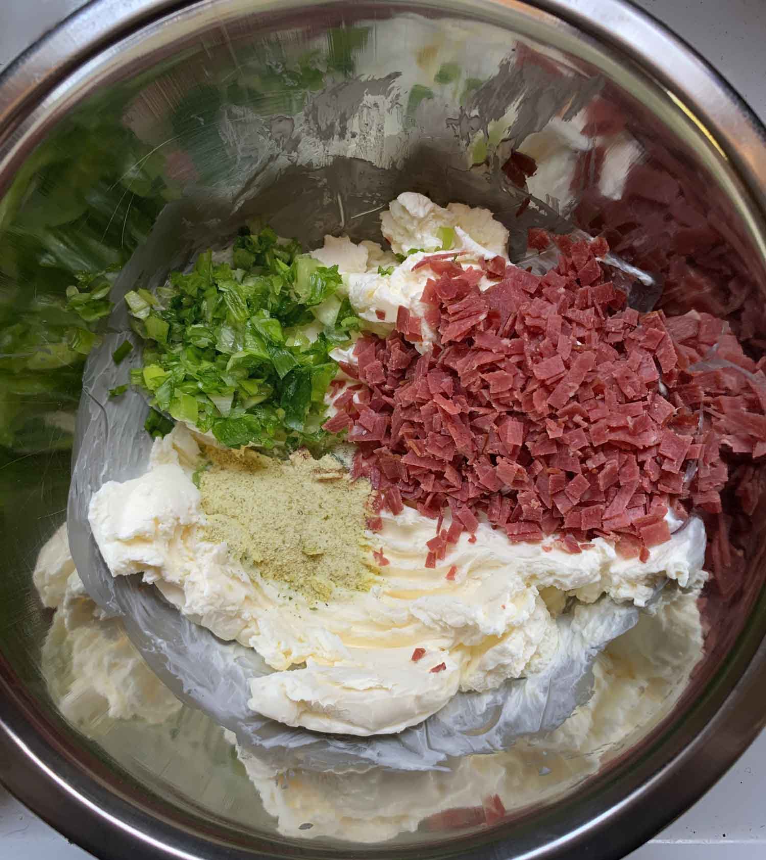 Overhead view of the ingredients in the bowl, ready to mix.