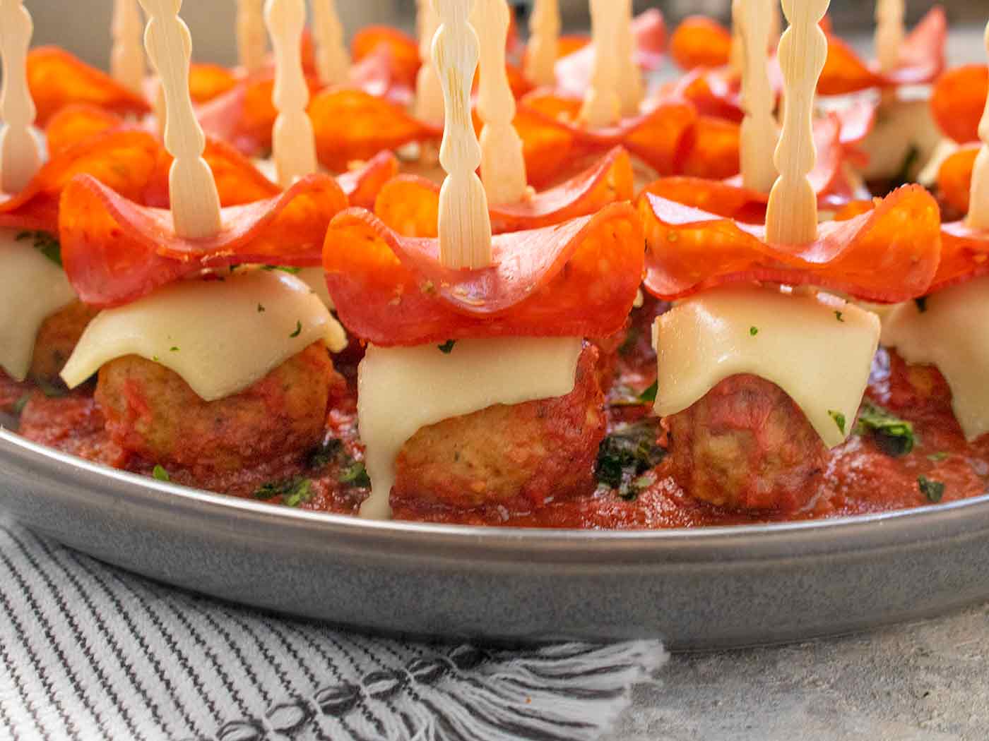 Close-up, side-view of Pizza Meatballs.