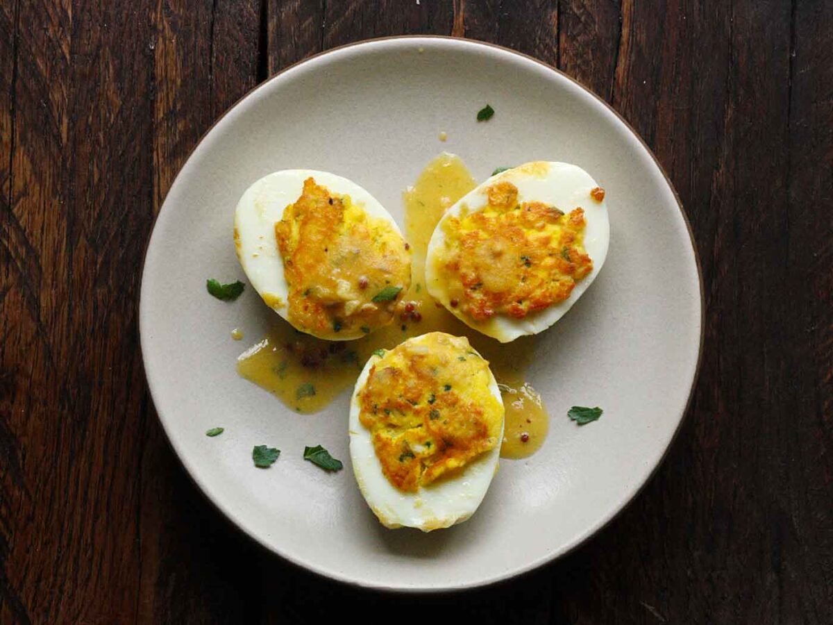 Three Fried Deviled Eggs on a Plate