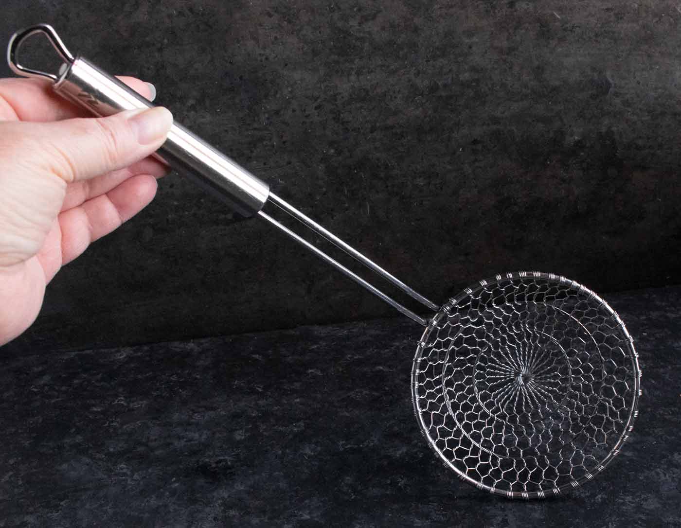 Photo of a metal strainer.