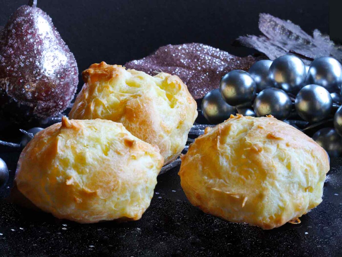 Three gougeres, ready to eat.
