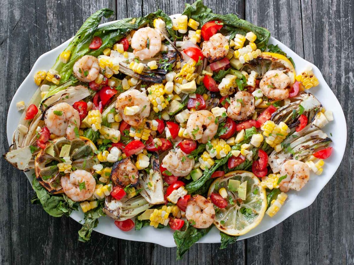 Grilled Romaine Salad with Shrimp on a white serving platter.