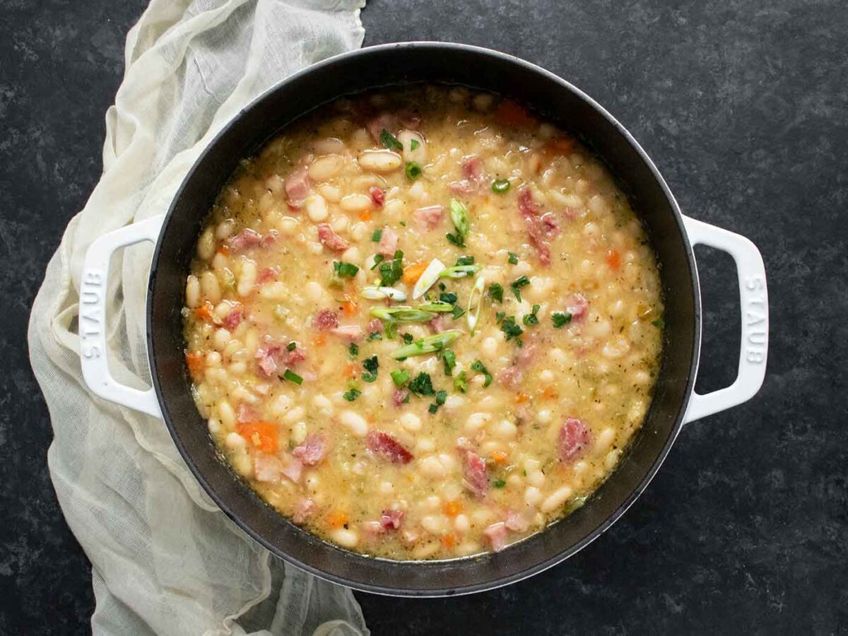 An overhead photo of a pot of Ham and Bean Soup, ready to serve.