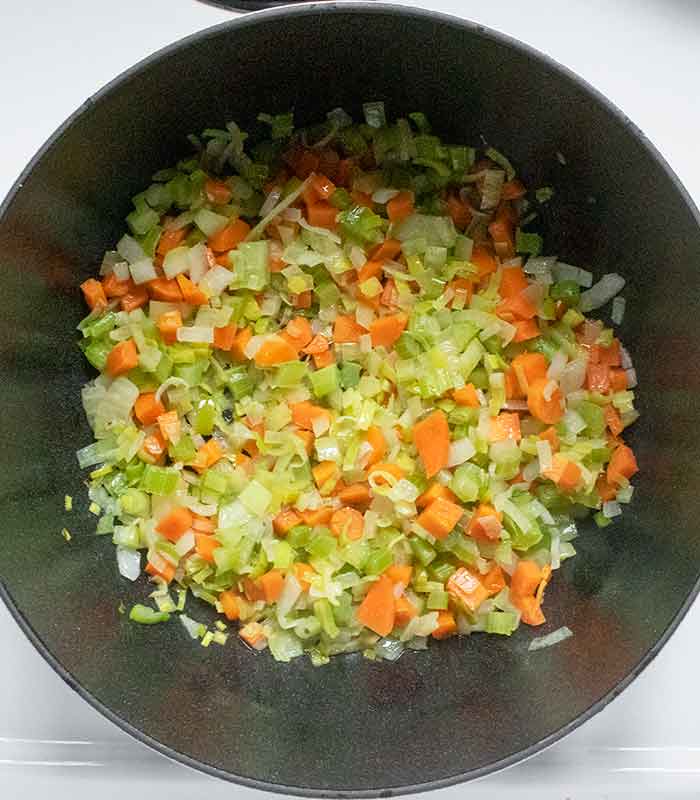 Aromatic veggies sauteeing in the soup pot.