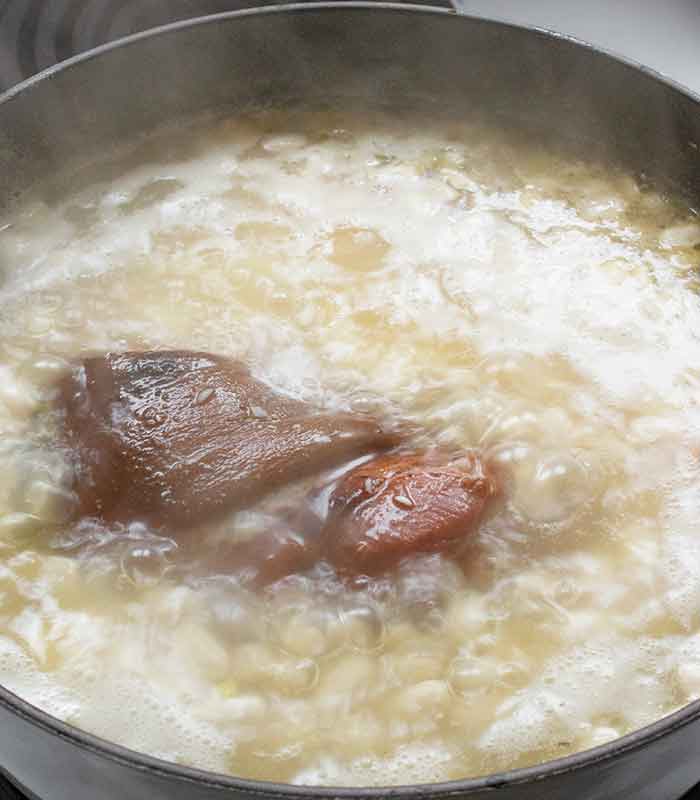 The bean soup simmering on the stove.
