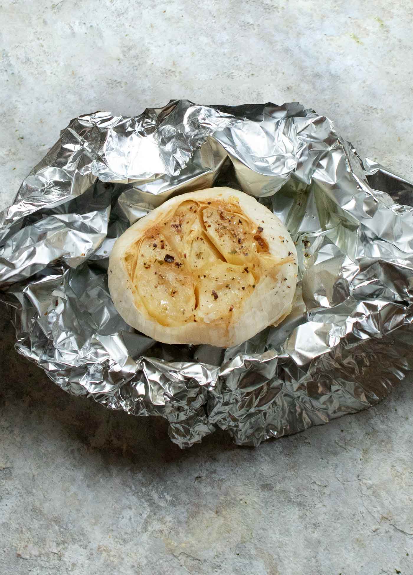 Roasted garlic in foil.