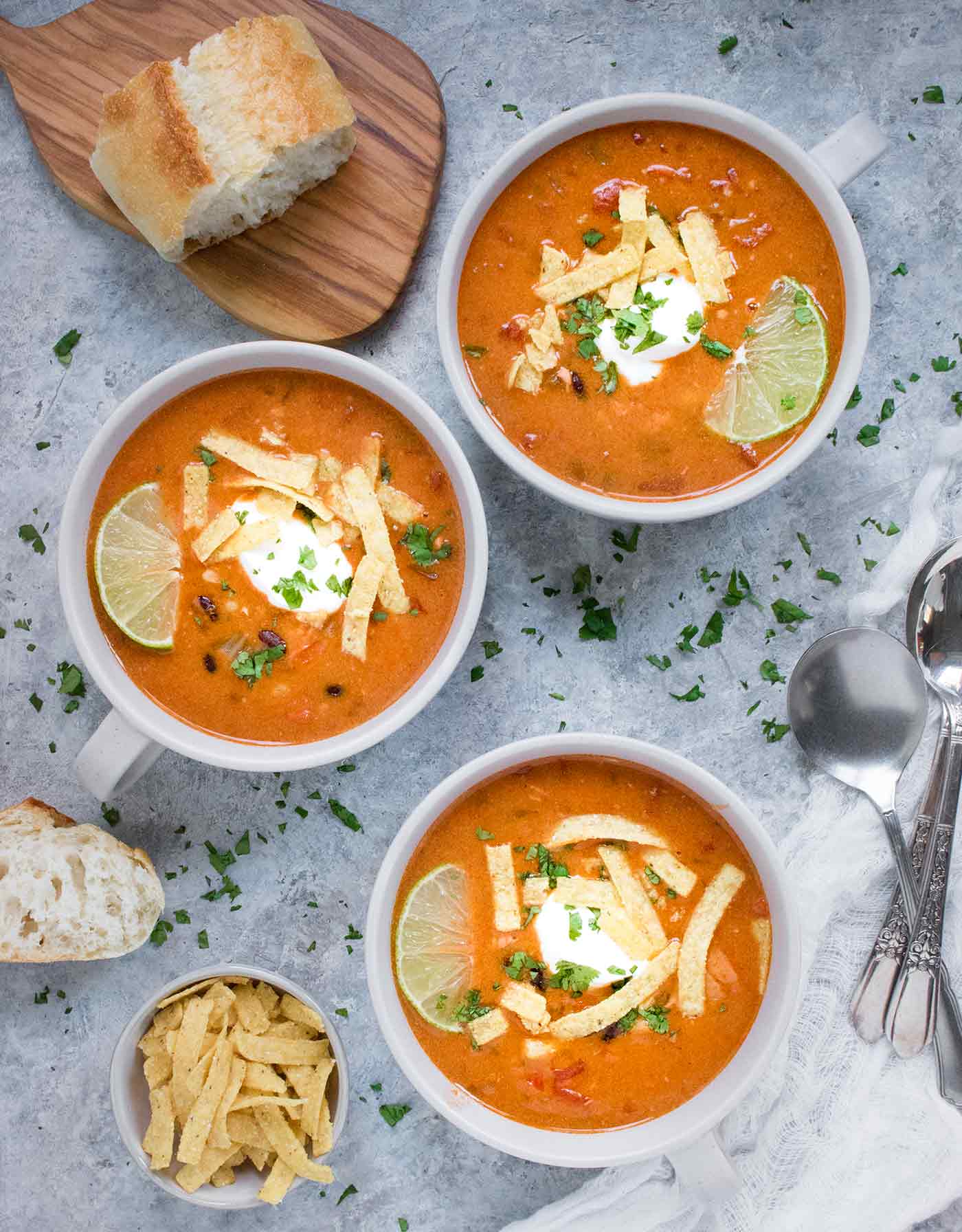 Three bowls of Instant Pot Chicken Tortilla Soup