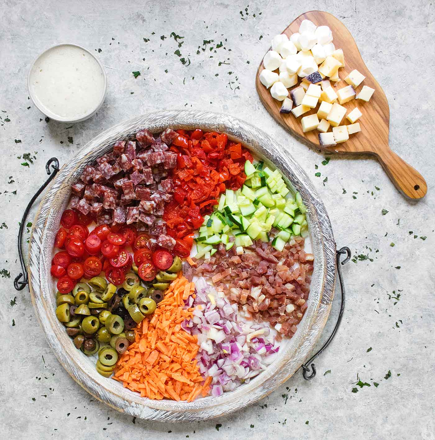 Ingredients for Italian Pasta Salad on a serving board
