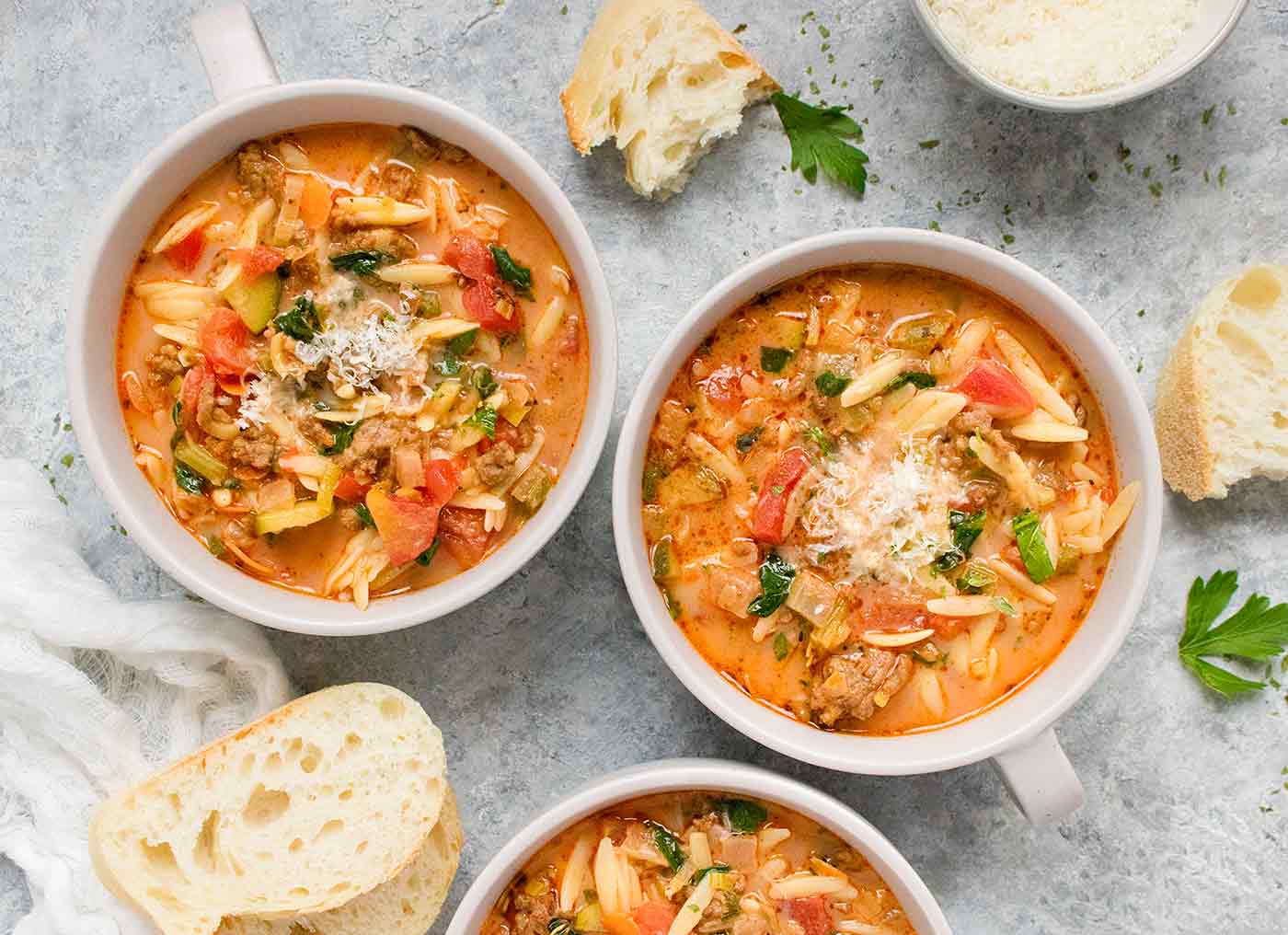 Three bowls of Italian Sausage Orzo Soup