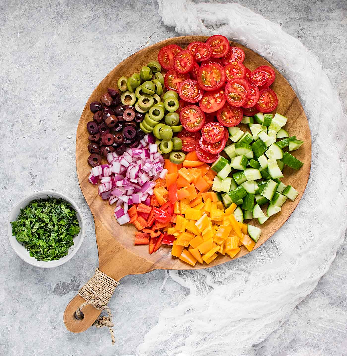 Ingredients for Meditarranean Chopped Salad on a serving board