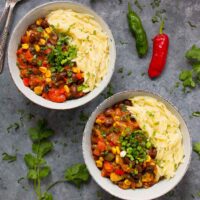 Two bowls of Mexican chili with orzo, ready to serve!