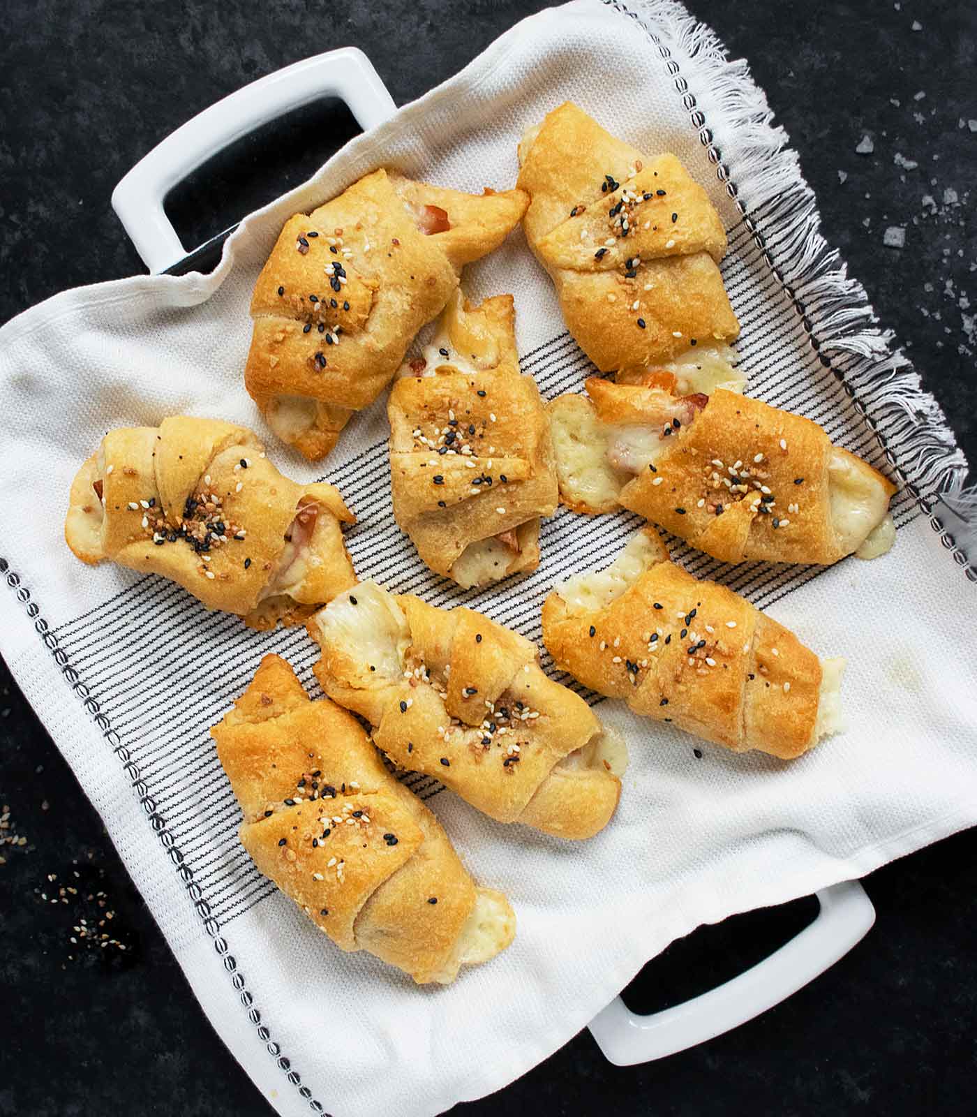 Mortadella Stuffed Crescent Rolls on a serving plate.