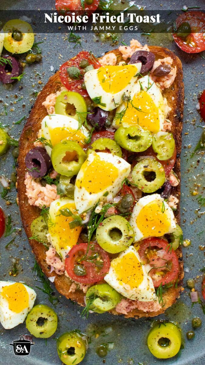 Pinterest pin image for a recipe for Nicoise Fried Toast, featuring overhead view of one toast in a vertical orientation.