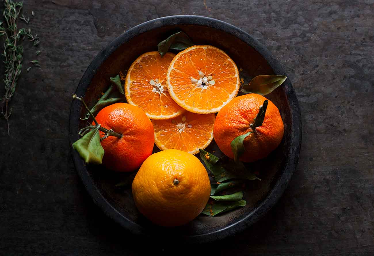 Oranges on a plate.
