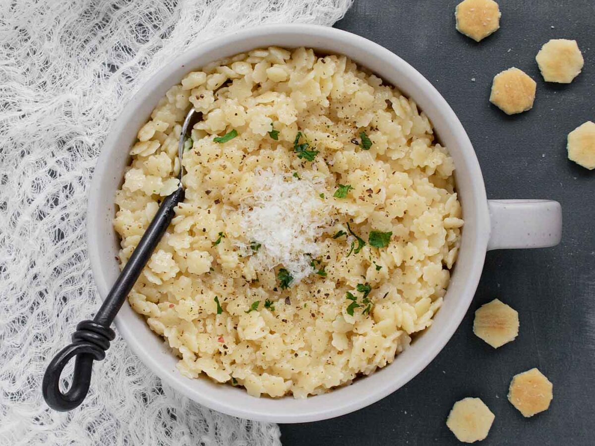 Overhead shot of a bowl of Pastina soup.