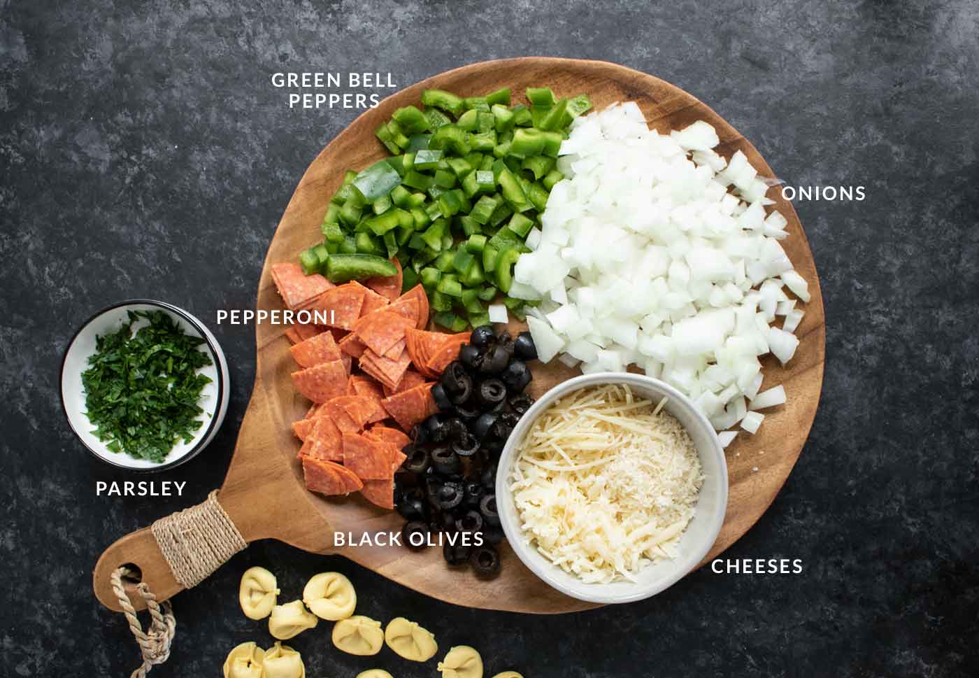 Prepped ingredients arranged on a wooden cutting board.