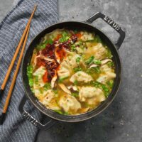 Overhead photo of Dutch oven filled with Potsticker Soup.