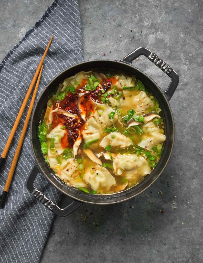 Overhead photo of Dutch oven filled with Potsticker Soup.