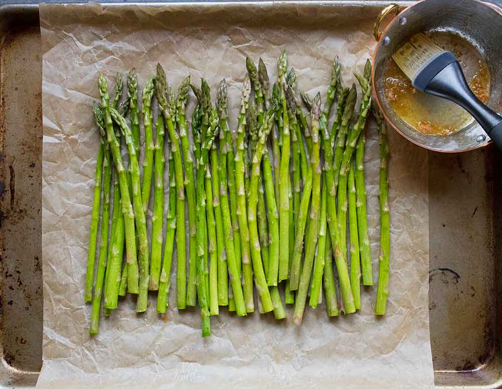 Fresh spring asparagus, ready to be brushed with miso butter and roasted.