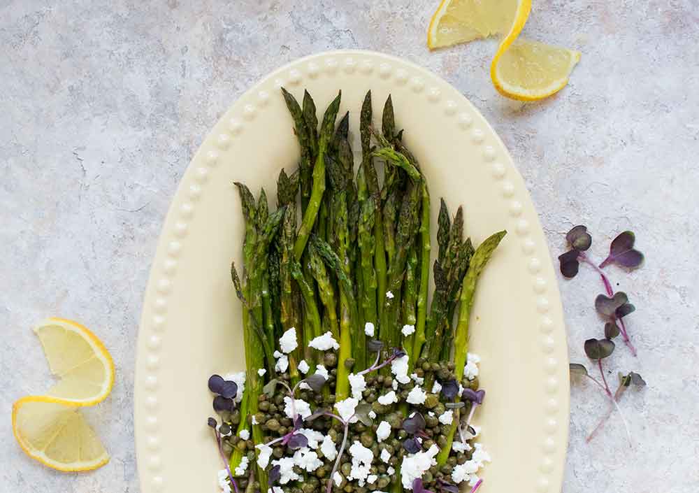 Roasted asparagus on a serving platter.