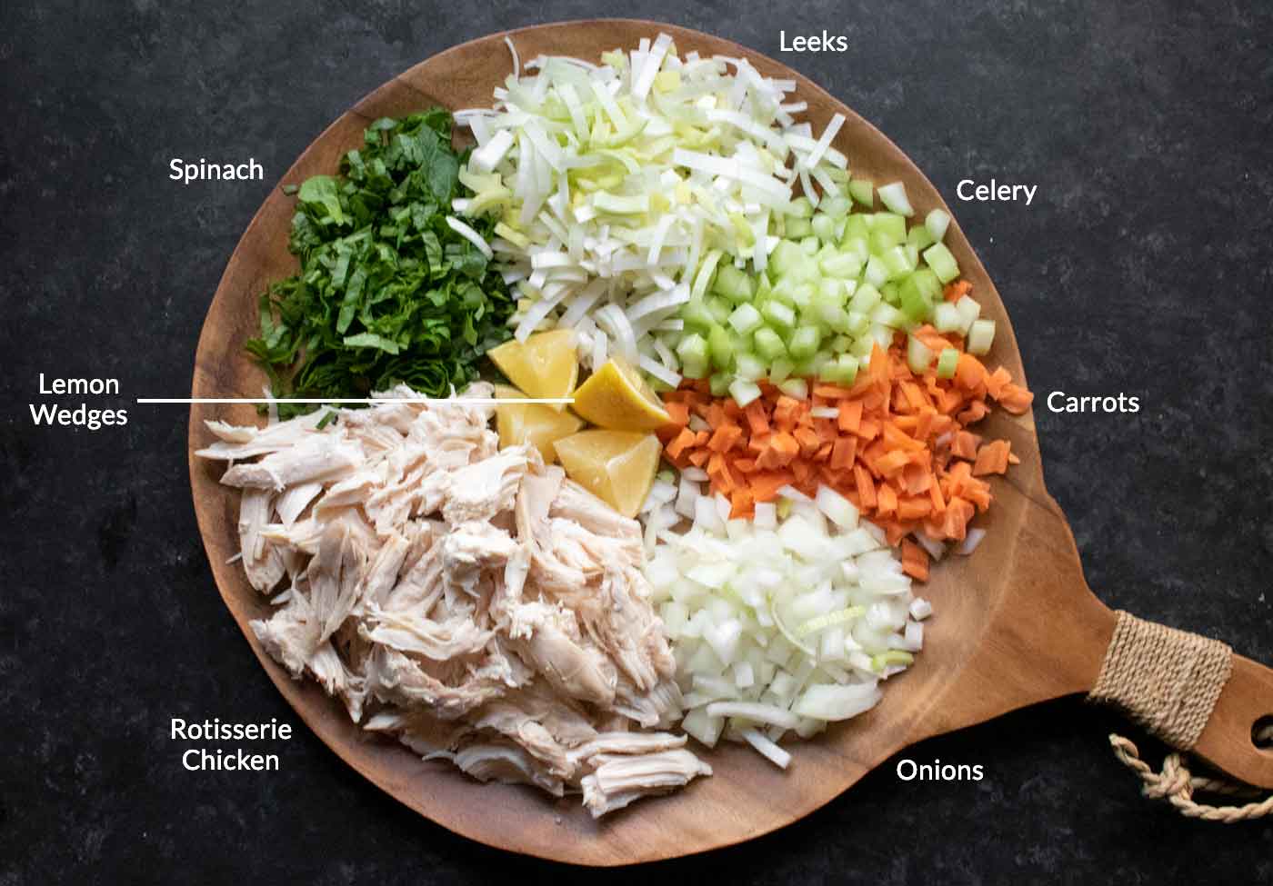 Prepped ingredients on a wooden serving board.
