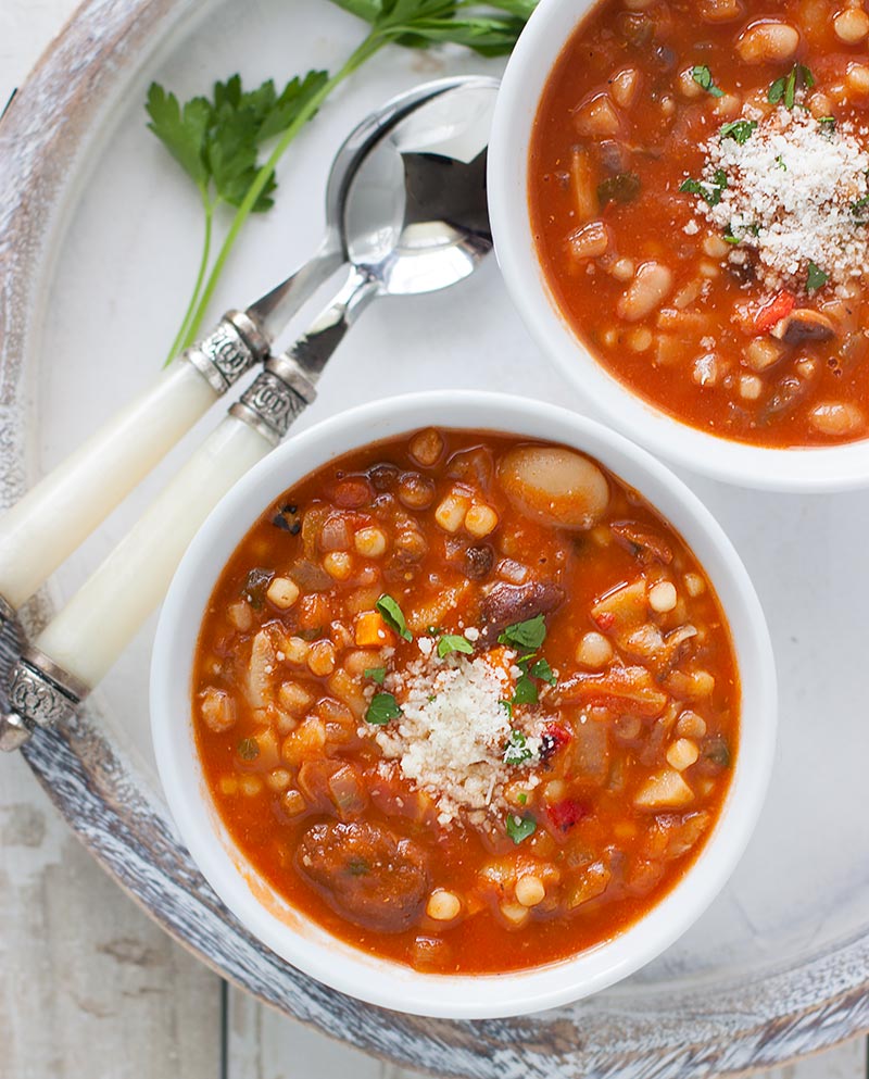 Two bowls of Sardinian Minestrone on a serving tray