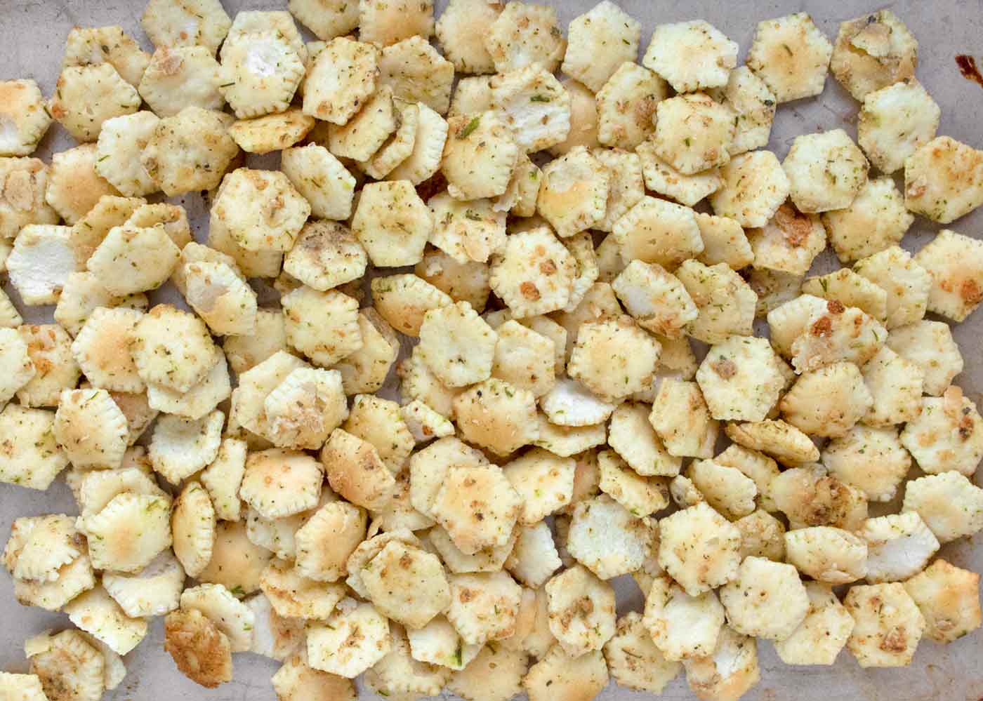 Close-up of Seasoned Oyster Crackers on a sheet pan.