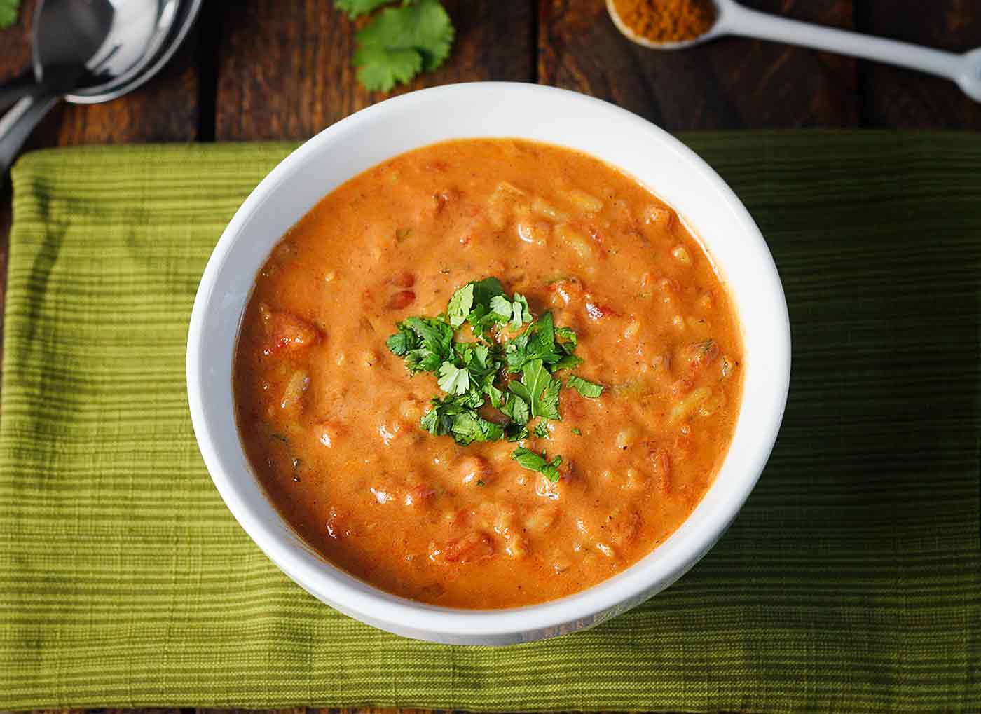 Close-up of Shrimp Tikka Masala Soup in a white bowl