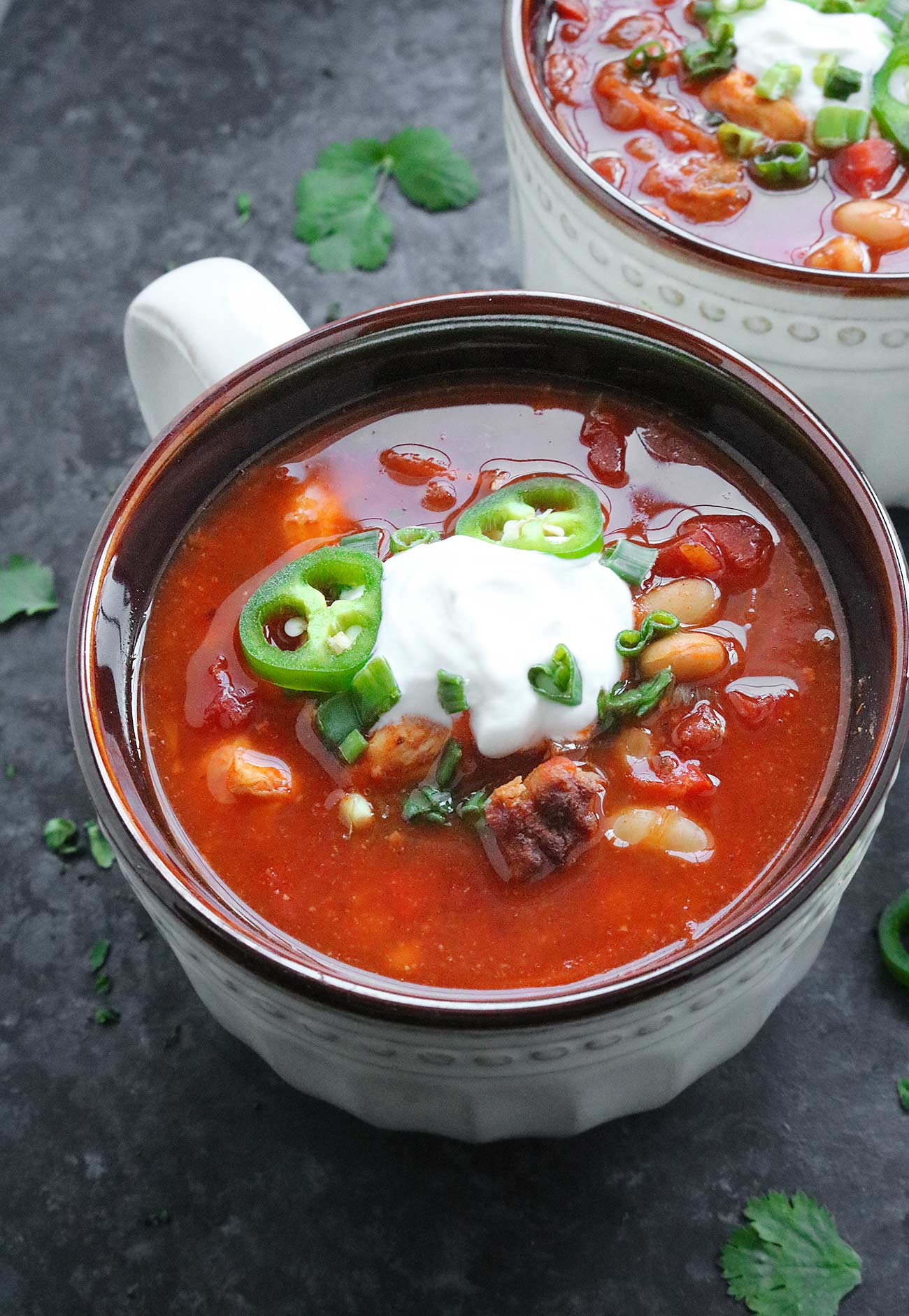 A big mug filled with BBQ Chicken Soup.