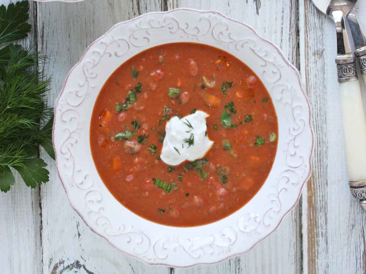 Slow-simmered Red Bean Soup in a decorative white bowl.