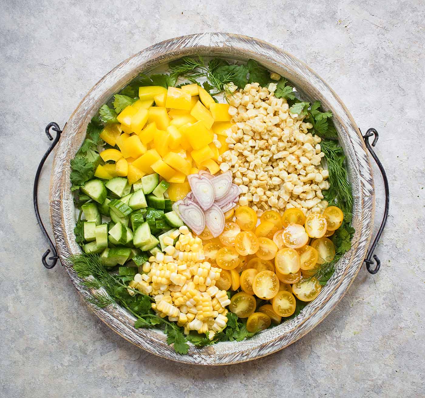 Ingredients for Smoked Corn Gazpacho on a serving tray