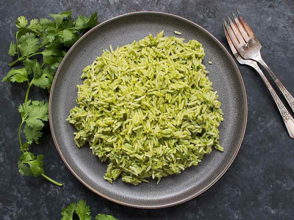 Spicy Green Rice on a dark gray plate.