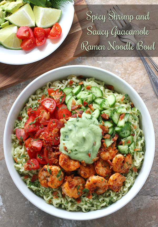 Pinnable overhead photo of Spicy Shrimp and Saucy Guacamole Ramen Noodle Bowl with a side of lime wedges